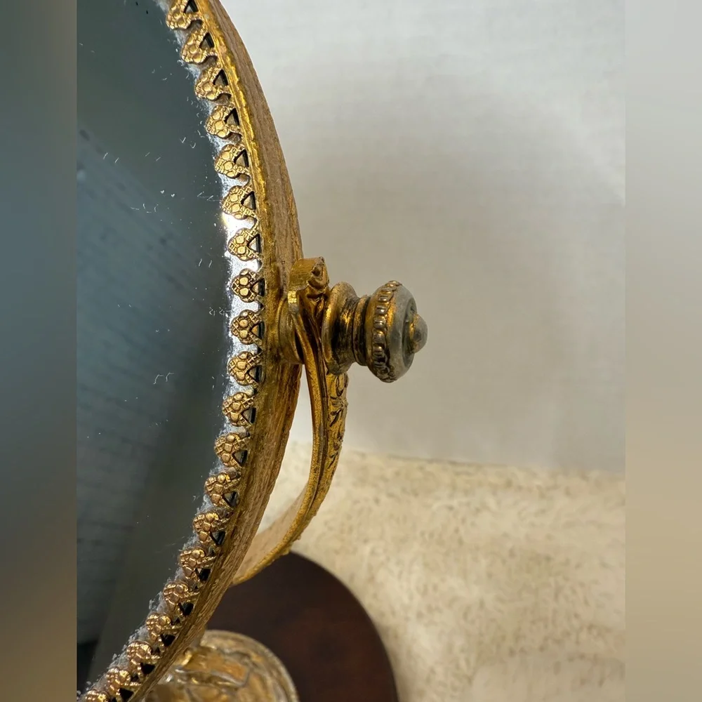 VTG Stylebuilt double sided gold-tone tilting vanity mirror with a ornate stand